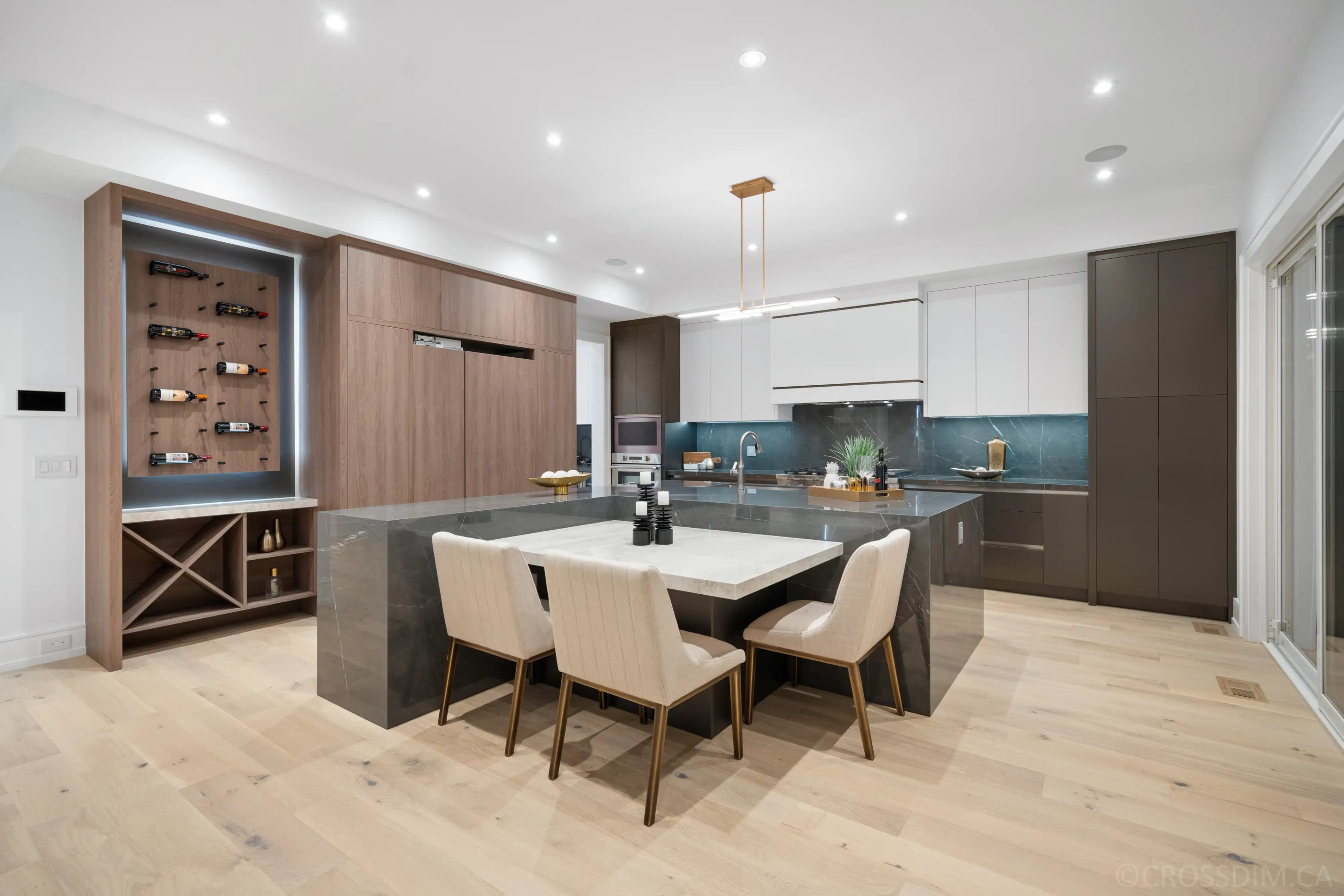 Home kitchen with a beautiful countertop and modern cabinets